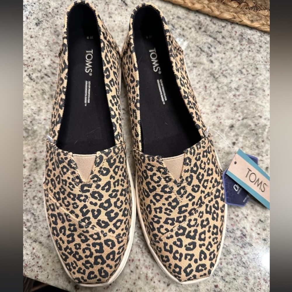 Brand new cheetah print toms size 9